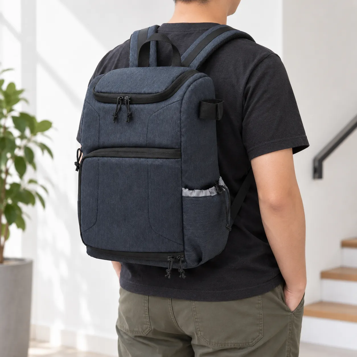 Edwin Camera Backpack — alternate view; demonstration equipment is not included