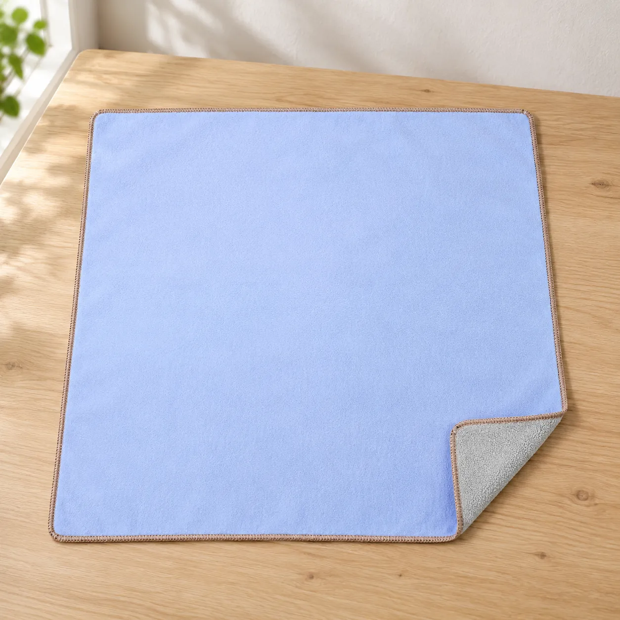 plain self-adhering fabric camera wrap: lead view; props not included